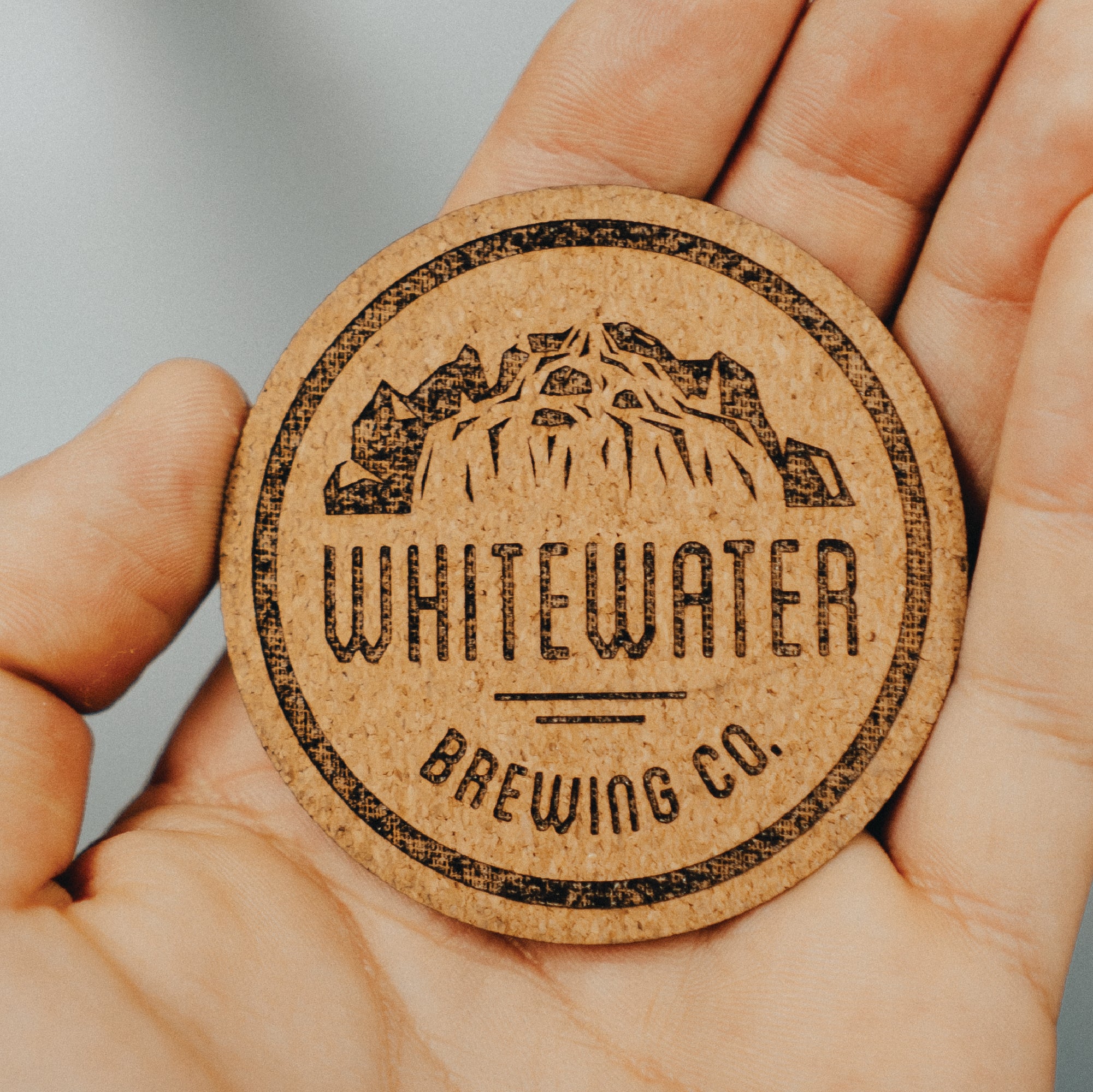 Hand holding a custom patch